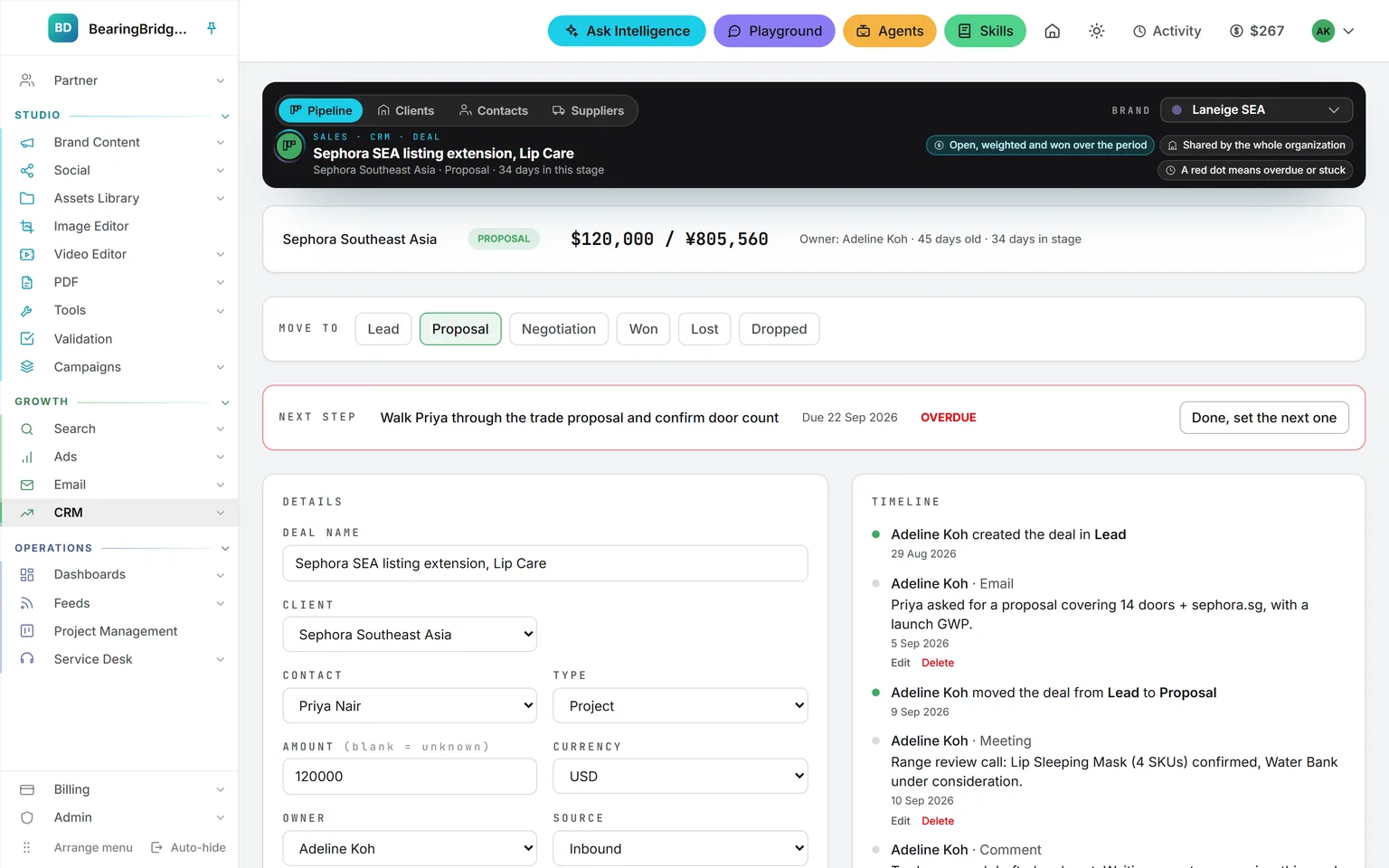 One deal, top of the page: the stage stepper at Proposal, the pinned next step with Done, set the next one, the client and contact fields, and the start of the timeline