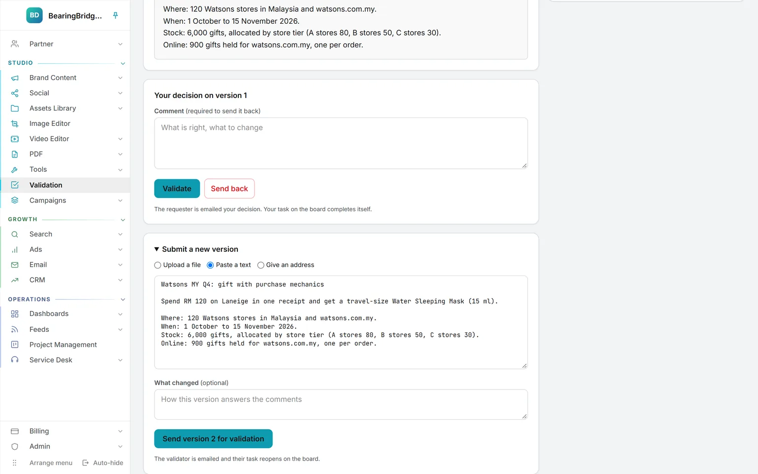 One asset seen by its requester: the current text version, the validator, the decision box, and Submit a new version open with the paste-a-text option selected